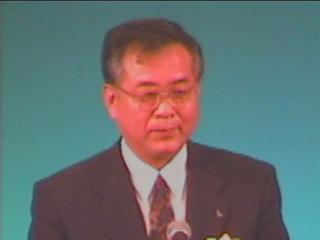 因島市助役 小江章氏